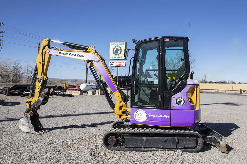 Mini Excavator with a Foster Connections wrap