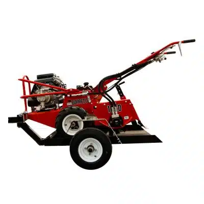 Rototiller on trailer on white background